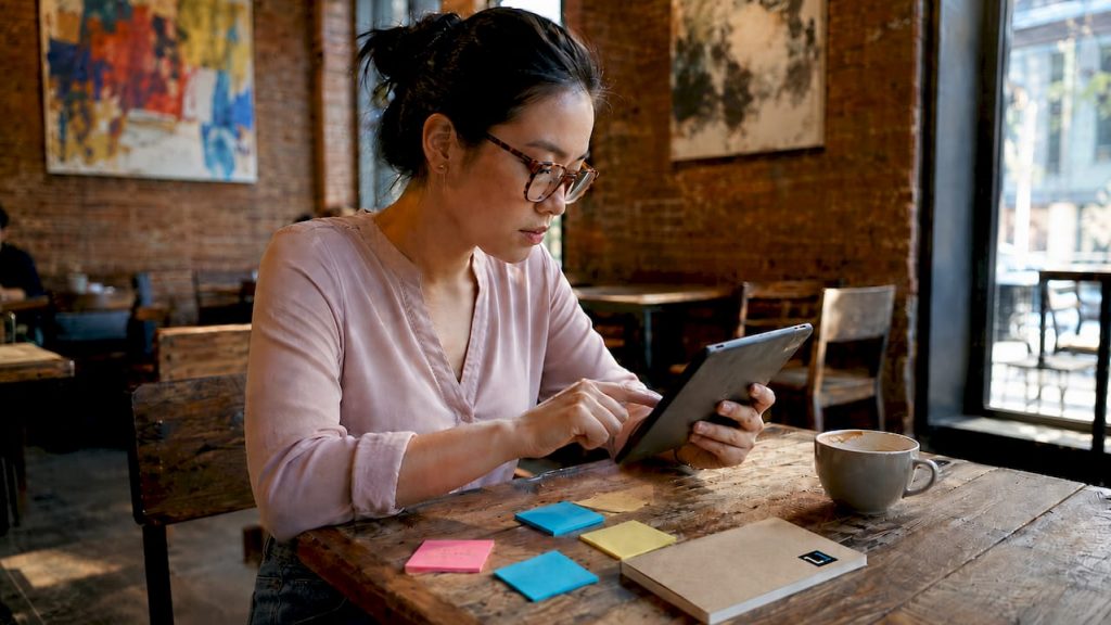 Woman working in modern agency office space
