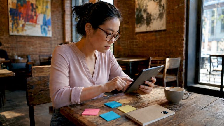 Woman working in modern agency office space