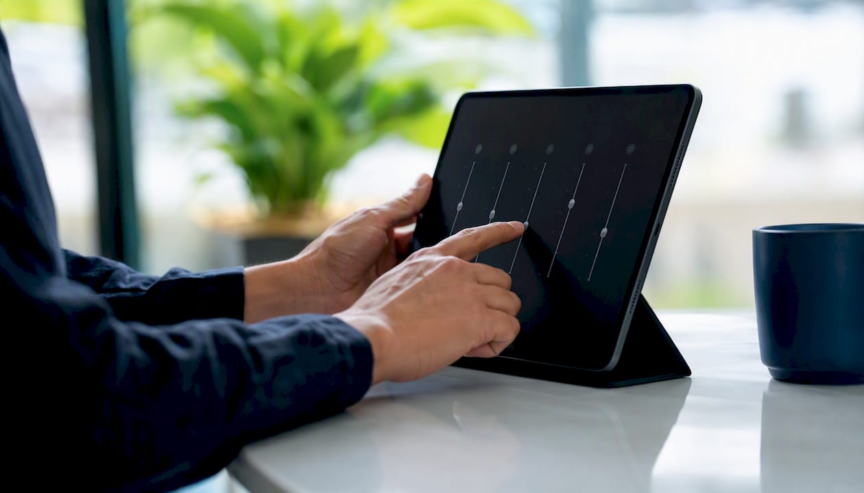 Hands adjusting settings symbolizing LinkedIn outreach automation
