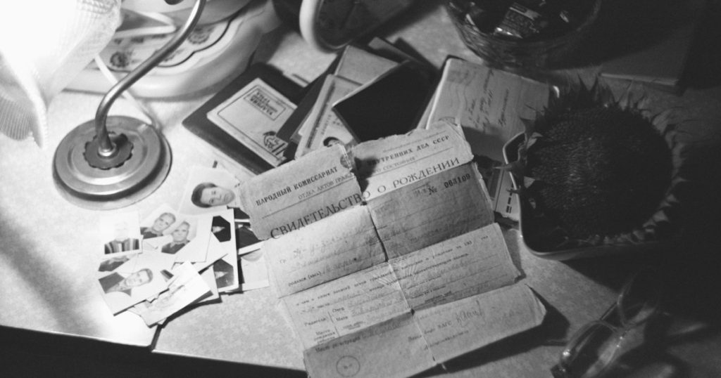Desk covered in documents used for research