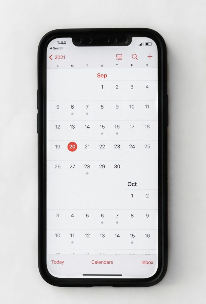 Smartphone showing a calendar app displaying a booked meeting reminder