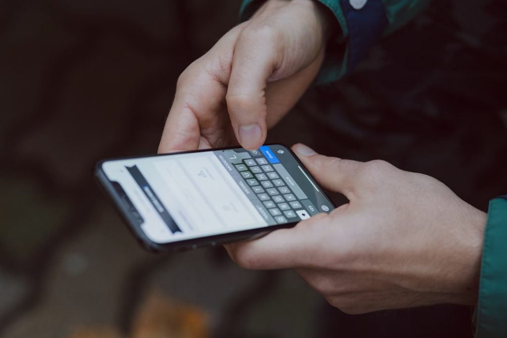 Person using a smartphone to send a LinkedIn message